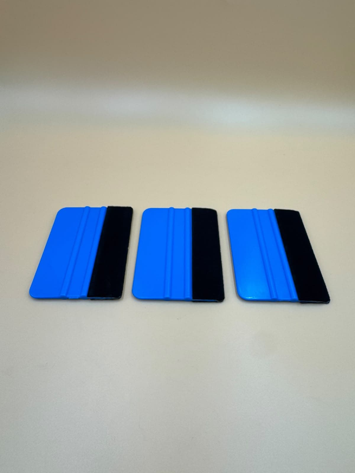 ESPATULA AZUL E PRETA PARA APLICAR PELICULA